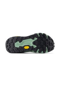 Semelle extérieure en caoutchouc noir avec un intercalaire vert et un logo Vibram jaune. Le motif de la semelle présente des formes hexagonales et triangulaires pour une meilleure adhérence.