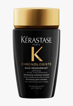 Flacon de shampooing Kérastase Chronologiste noir et or de 80 ml, pour revitaliser la jeunesse et les cheveux affaiblis par le vieillissement.