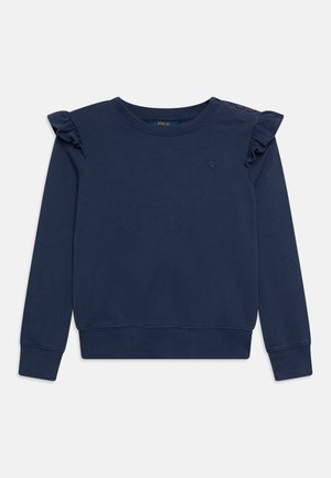 Sudadera de manga larga azul marino con detalles de volantes en los hombros y tres botones en el hombro izquierdo, que presenta un pequeño logo bordado.