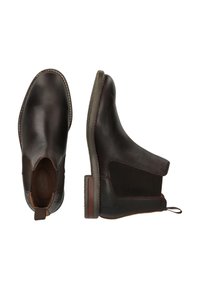 Bruna läderankelboots med elastiska sidopaneler, rund tå, kontrasterande sömmar och låg klack. Texturerad yta och dragflikdetalj.