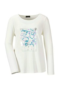 Langärmliges weißes Hemd mit einem dekorativen Druck in Blau- und Violetttönen, Glitzerdetails und einem boxy Design.