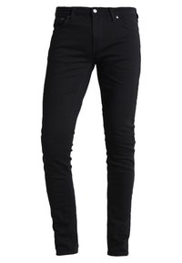 Černé džíny s úzkým střihem z denimu, se středním pasem, pětiprázdnovým designem a kontrastním prošíváním. Klasické zapínání na knoflík a zip.