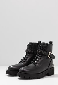 Steven New York Botines camperos - black