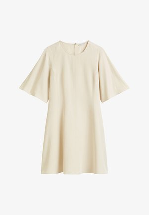 Robe couleur crème avec des manches courtes en forme de cloche, un col rond et une couture centrale descendant verticalement sur le devant. Étiquette du fabricant visible.