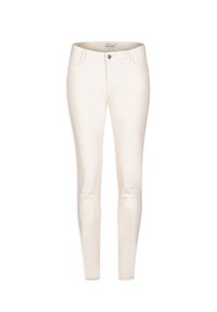 Jeans ajustados en suave tela de mezcla de algodón color crema. Cuenta con cinco bolsillos, una cremallera y un cierre de botón. Textura suave.
