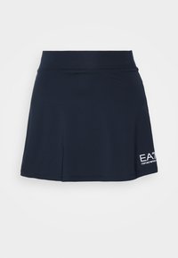Navy blue skirt made of smooth fabric, featuring a flared design with an elastic waistband and a white logo detail on the lower left side.