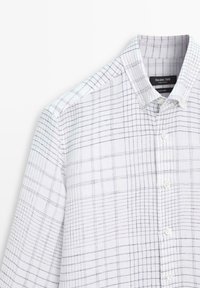 White button-up shirt with a fine black grid pattern, button-down collar, and long sleeves.