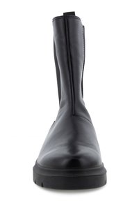 Bottines en cuir noir avec une finition lisse, des panneaux latéraux en élastique et une épaisse semelle en caoutchouc noir. Silhouette élégante et épurée.