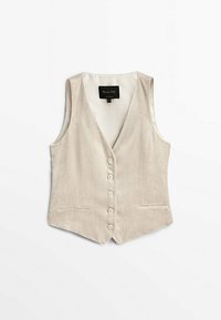 Beige Cord-Vest mit V-Ausschnitt, sechs Knöpfen und zwei Fronttaschen. Strukturstoff und taillierte Form.
