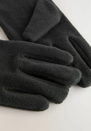Guanti in pile neri con una texture morbida, caratterizzati da un design a cinque dita e cuciture lungo i bordi. Gli accenti sono semplici e privi di decorazioni.
