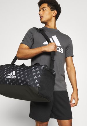 GRAPHIC UNISEX - Sports bag - black/white