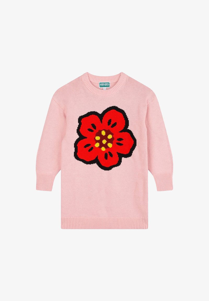Pull en tricot rose avec un grand motif de fleur noir et rouge, au centre jaune. Manches longues et col et ourlet côtelés.
