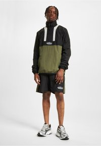 UNFAIR ATHLETICS Poletna jakna - black green
