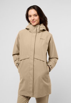 Light beige waterproof jacket with a hood, front zipper, and spacious pockets; features a smooth texture and a relaxed fit design.