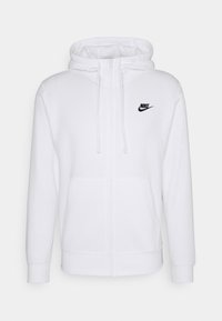 Vit fullzip hoodie med framfickor, snörning vid huvan och svart Nike-logotyp på vänster bröst mot en enkel bakgrund.