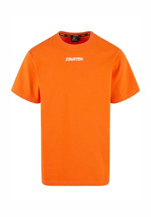 T-shirt en coton orange à manches courtes. L'avant présente un logo blanc "STARTER." centré sur la poitrine. Design classique à encolure ras du cou.