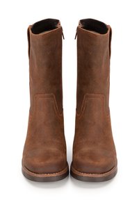 Brown suede ankle boots with a smooth texture, mid-height shaft, side zippers, and contrasting stitching detail.
