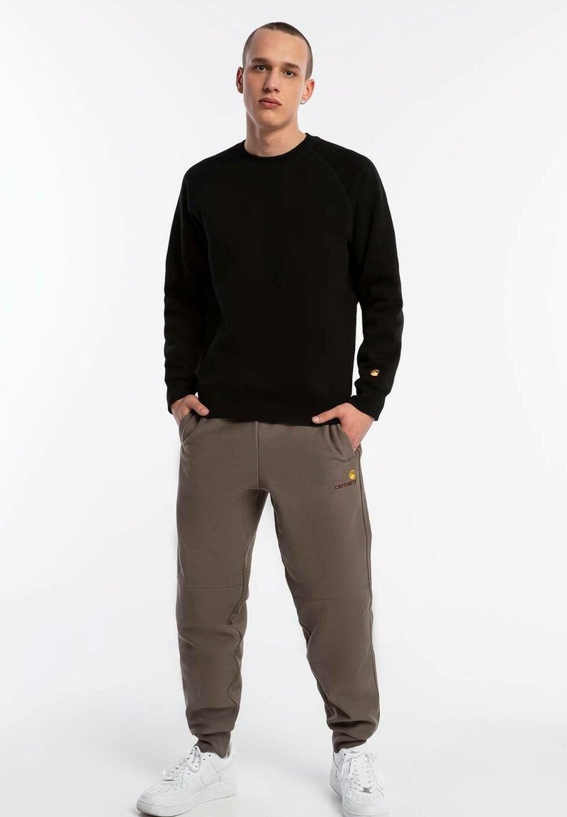 Carhartt WIP AMERICAN SCRIPT JOGGING - Pantalon de survêtement - brąz
