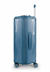 Hartschalentrolley in Hellblau mit strukturierter Oberfläche, einem teleskopischen Griff, einem Seitengriff und vier drehbaren Rollen für mühelose Mobilität.