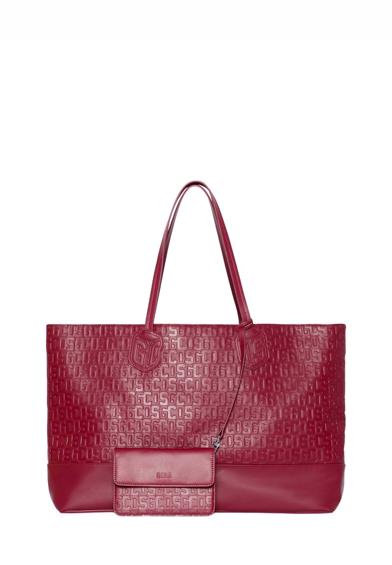 Borsa a mano in pelle rossa con loghi in rilievo, due spallacci e una pochette staccabile con chiusura magnetica. Texture liscia e forma strutturata.