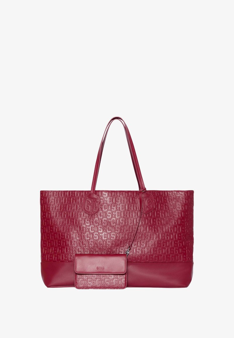 Borsa a mano in pelle rossa con loghi in rilievo, due spallacci e una pochette staccabile con chiusura magnetica. Texture liscia e forma strutturata.