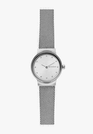 Silberner Metalluhren mit Mesh-Armband, ovalem Ziffernblatt, weißem Zifferblatt und funkelnden Stundenmarkierungen. Bietet ein minimalistisches Design und eine elegante Ausführung.