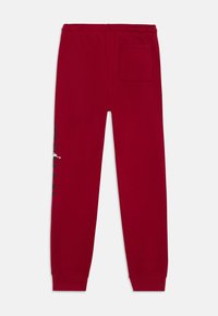 Jordan STRETCH PANT UNISEX - Παντελόνι φόρμας - red