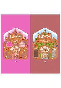 Butternut Face Palette-emballage formet som et peberkagehus med blank glasur, farverige slikdetaljer og to rum til makeup.