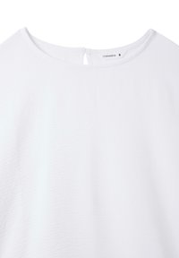 Top bianco con finitura testurizzata, scollatura tonda e dettaglio a chiave sul retro. Realizzato in tessuto leggero. Etichetta che riporta 'Terranova' taglia S.