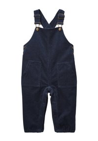 Salopette en velours côtelé bleu marine avec des bretelles réglables, des éléments en métal, deux poches avant et des poignets élastiqués aux chevilles.