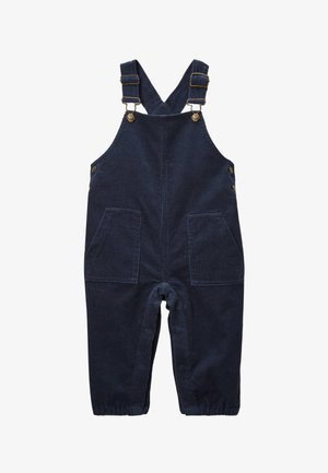 Salopette en velours côtelé bleu marine avec des bretelles réglables, des éléments en métal, deux poches avant et des poignets élastiqués aux chevilles.