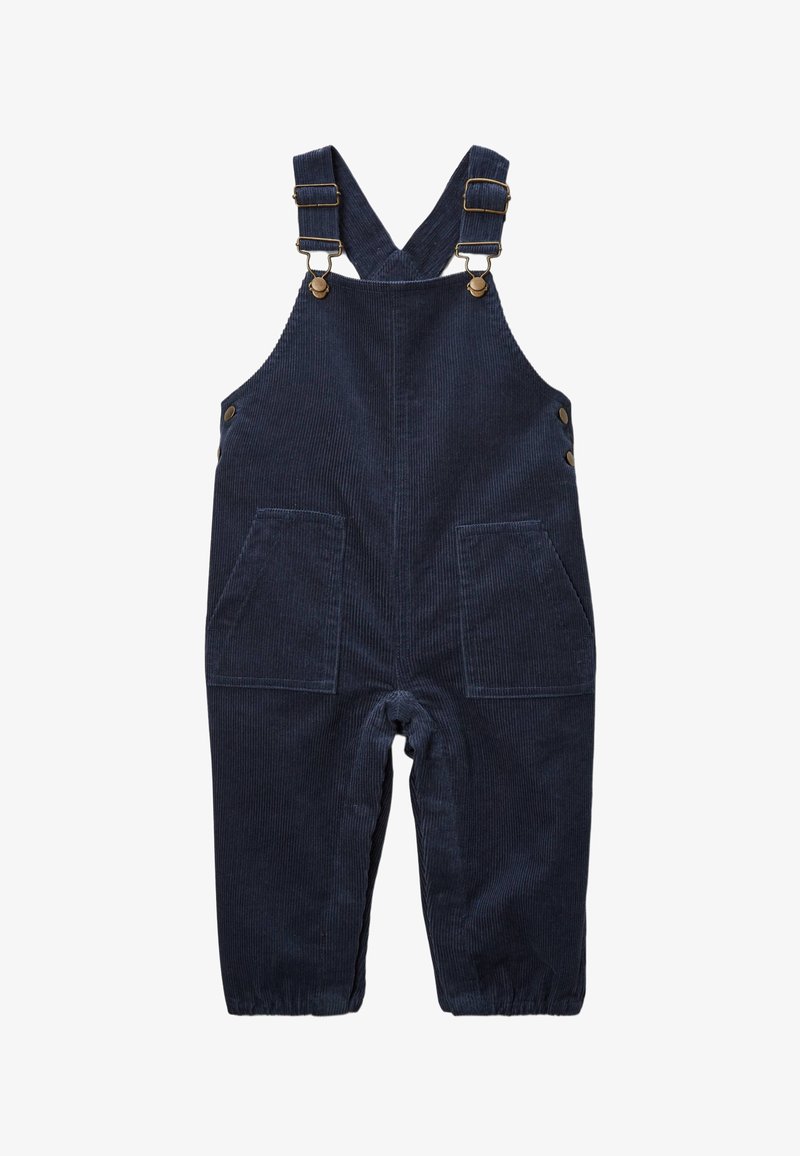 Salopette en velours côtelé bleu marine avec des bretelles réglables, des éléments en métal, deux poches avant et des poignets élastiqués aux chevilles.