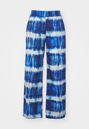 Szerokie spodnie z niebiesko-białym wzorem tie-dye z elastycznym pasem. Wykonane z lekkiego, przewiewnego materiału.