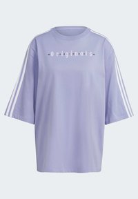 T-shirt oversized lilas en coton. Présente trois rayures blanches le long des manches et le texte "originals" sur la poitrine.