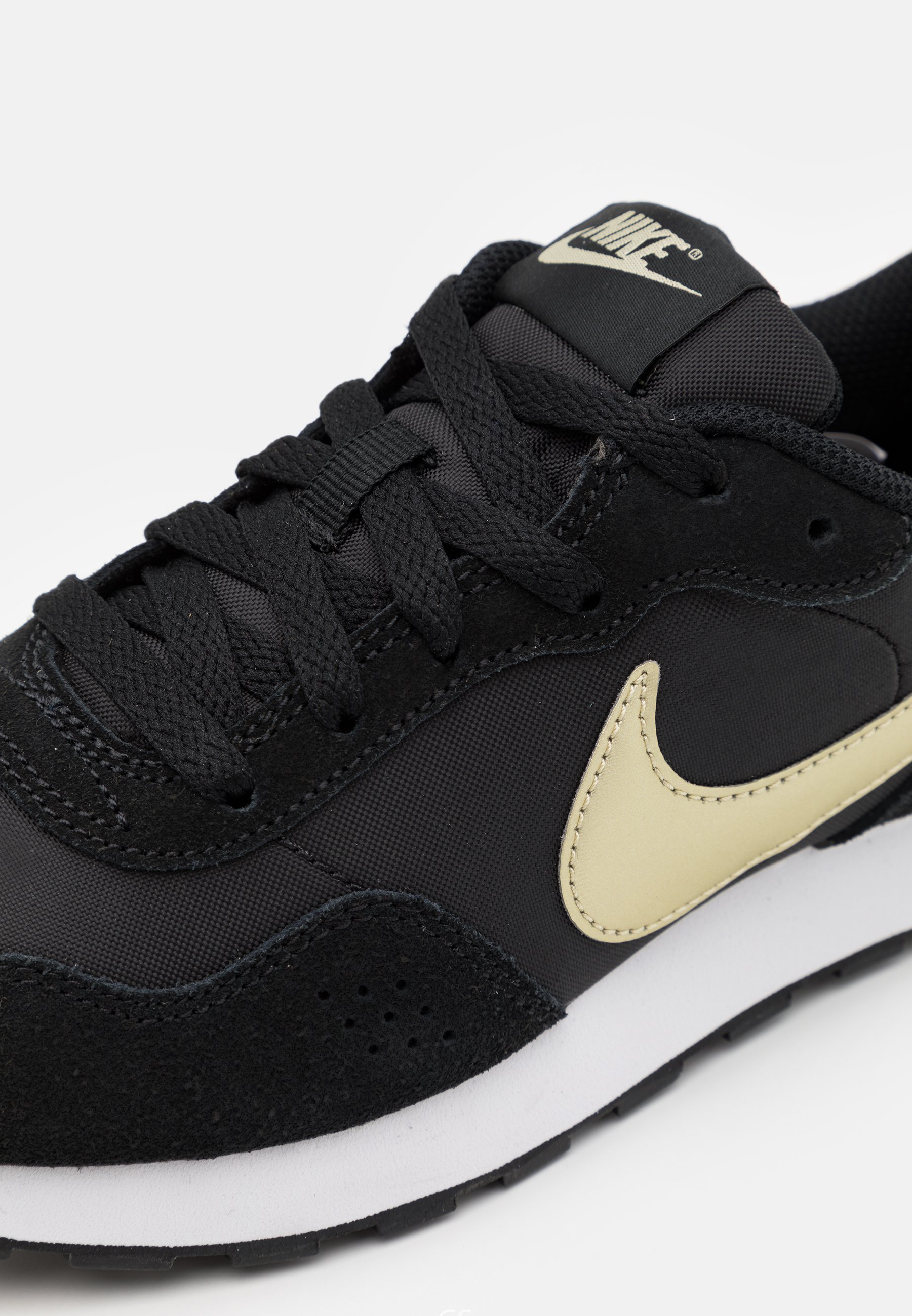 nike trainers black and gold