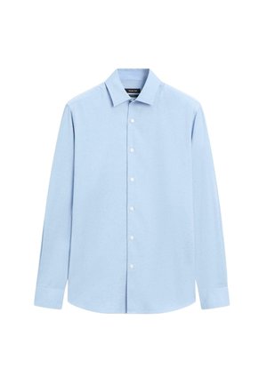 Camicia a maniche lunghe azzurro chiaro realizzata in un tessuto morbido. Presenta una chiusura con bottoni, colletto standard e orlo arrotondato.