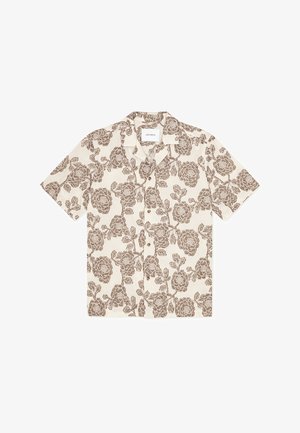 Πουκάμισο με κοντά μανίκια σε κρεμ απόχρωση με καφέ λουλουδένιο μοτίβο. Διαθέτει γιακά καμπάνιας και άνετη εφαρμογή. Ελαφρύ ύφασμα.