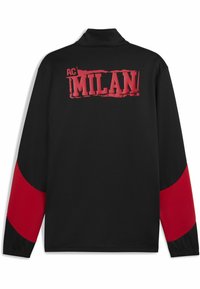 Must värvi sportlik jakk punaste aksentidega varrukatel ja seljal, millel on tugeva punase kulunud kirjatüübiga trükitud tekst "AC MILAN".