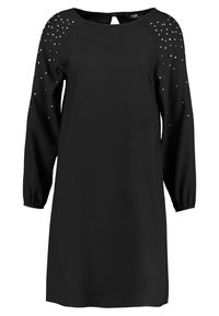 Robe noire à manches longues avec un col rond, présentant des épaules embellies de strass et des poignets froncés pour une silhouette légèrement évasée.