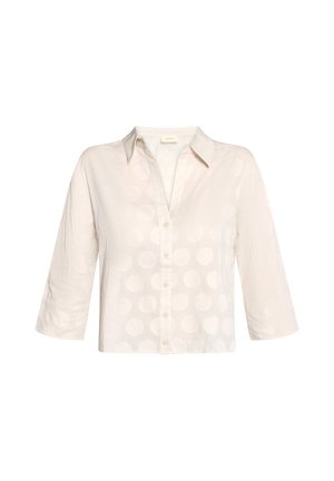 Crèmekleurige blouse met knopen, 3/4 mouwen en een subtiel groot polkadotpatroon, met een klassieke kraag en lichtgewicht stof.