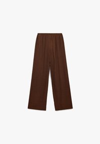 Pantalones marrones de pierna ancha con cintura elástica. Fabricados en tejido texturizado, con un acabado suave y un corte holgado.