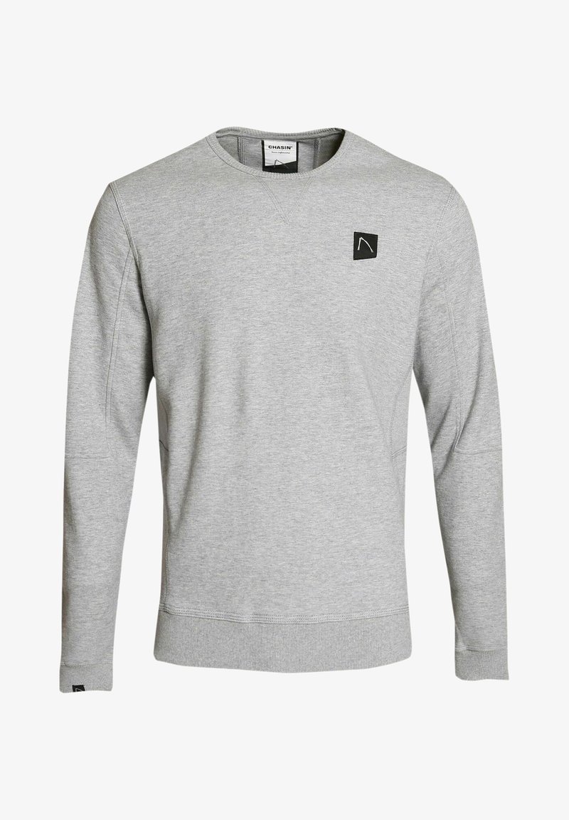 Sudadera gris de tejido suave, con cuello redondo, mangas largas, puños de canalé y un pequeño logo negro en la parte frontal.
