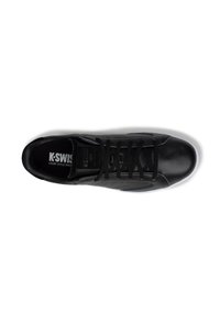 Black leather sneaker with textured accents, white rubber sole, and black laces. Features K-Swiss branding on the tongue and side.