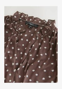 Nem kiválasztott, chocolate brown spot