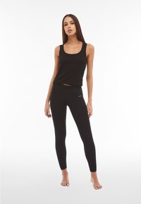 Freddy Leggings - jeans nero-cuciture in tono