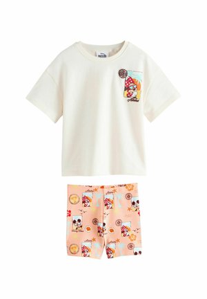 White short-sleeve shirt with Minnie Mouse graphic and soft pink shorts featuring tropical and Minnie Mouse patterns.