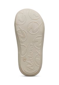 Suela de zapato de goma beige con una superficie texturizada, que presenta patrones circulares y "Naturino 20" grabado cerca del borde.