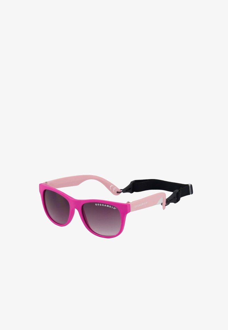 Vaaleanpunaiset aurinkolasit, joissa on kiinteä kehys, tummagradienttiset linssit ja joustavat vaaleanpunaiset sangat. Mukana musta säädettävä hihna, joka takaa varman istuvuuden.