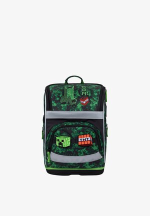 Zaino pixelato verde e nero con disegni Minecraft Creeper e blocco TNT sulle tasche anteriori e superiori.