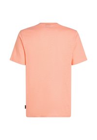 Kortærmet t-shirt i lys ferskenfarve, lavet af blød stof med en tekstureret overflade, med rund hals og uden synlige mønstre.